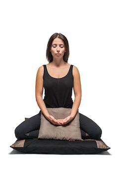 The Posture Of Meditation on a Cushion